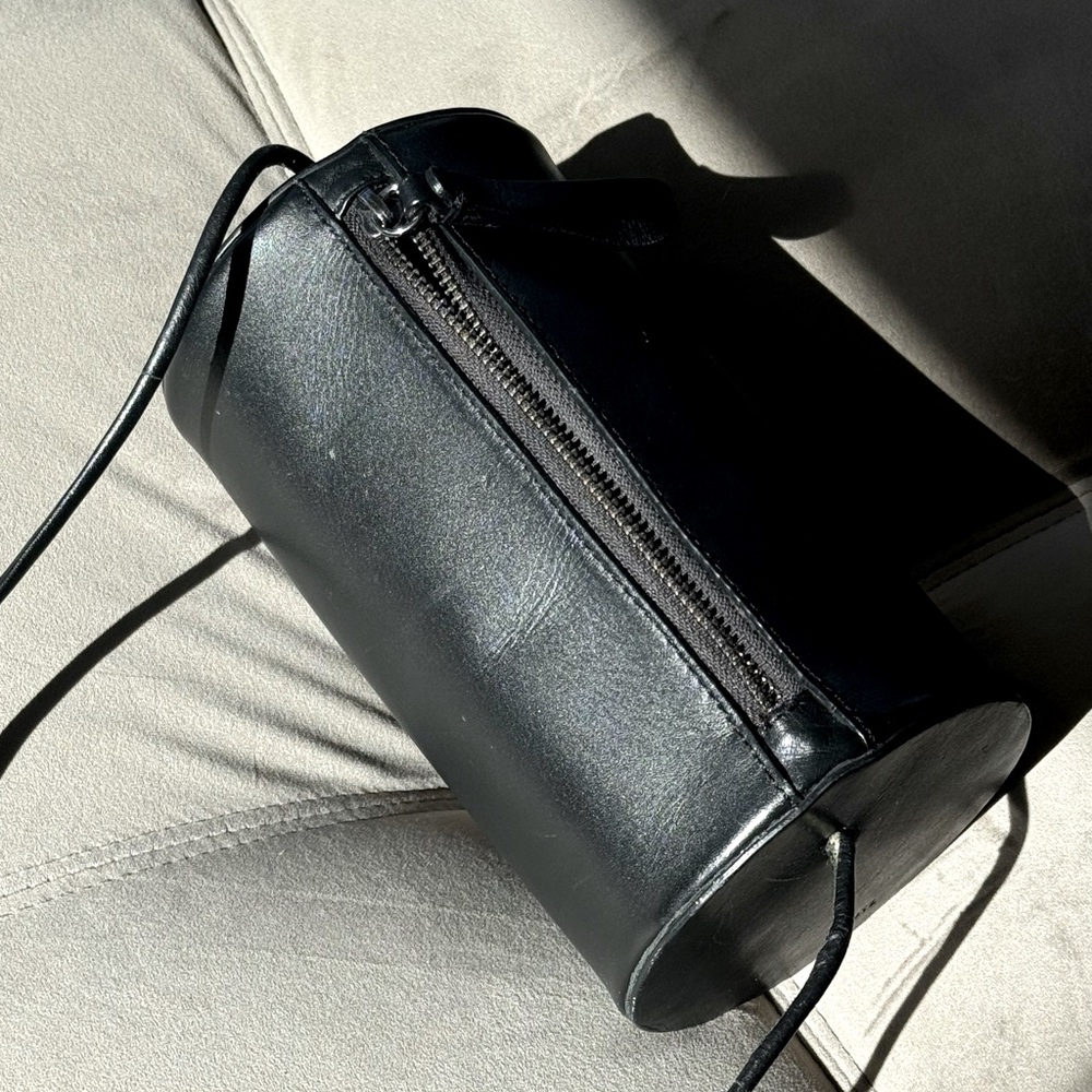 Schutz cylinder barrel bag small black crossbody leather